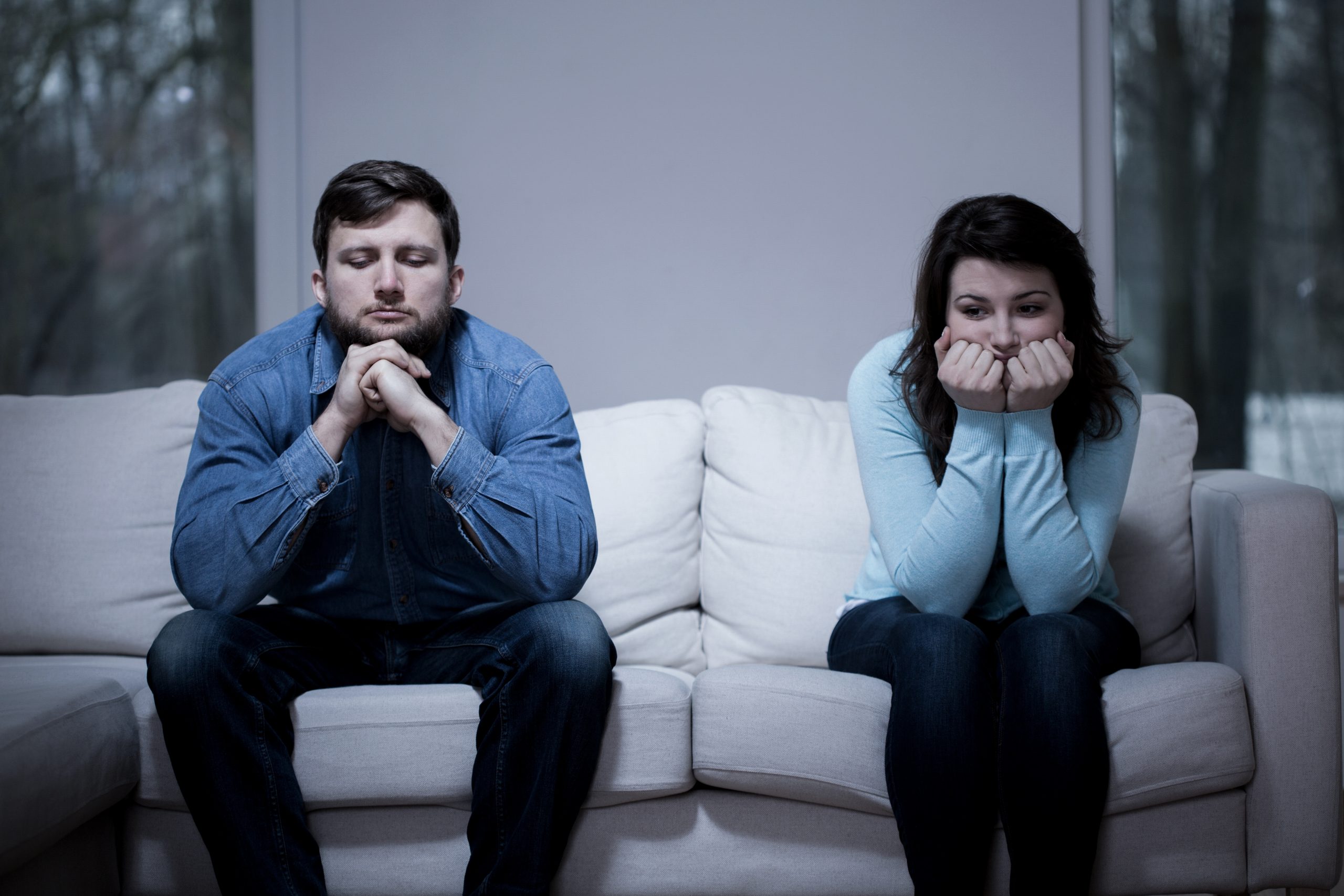 A couple having marriage problems is discussing divorce mediation with a Rochester NY attorney