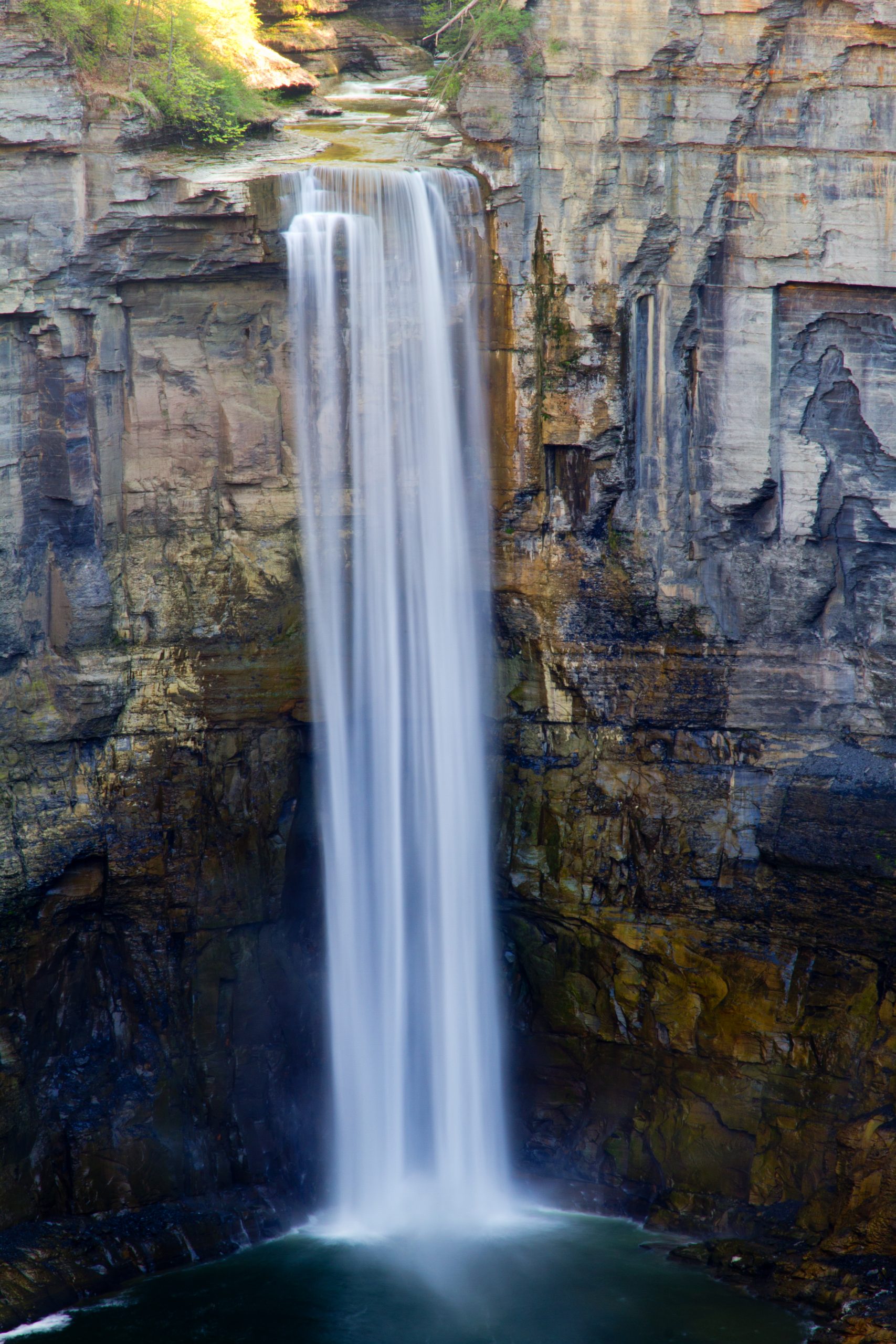 A waterfall is shown, which acts as a metaphor for the legal concept of collaborative law in Rochester, NY